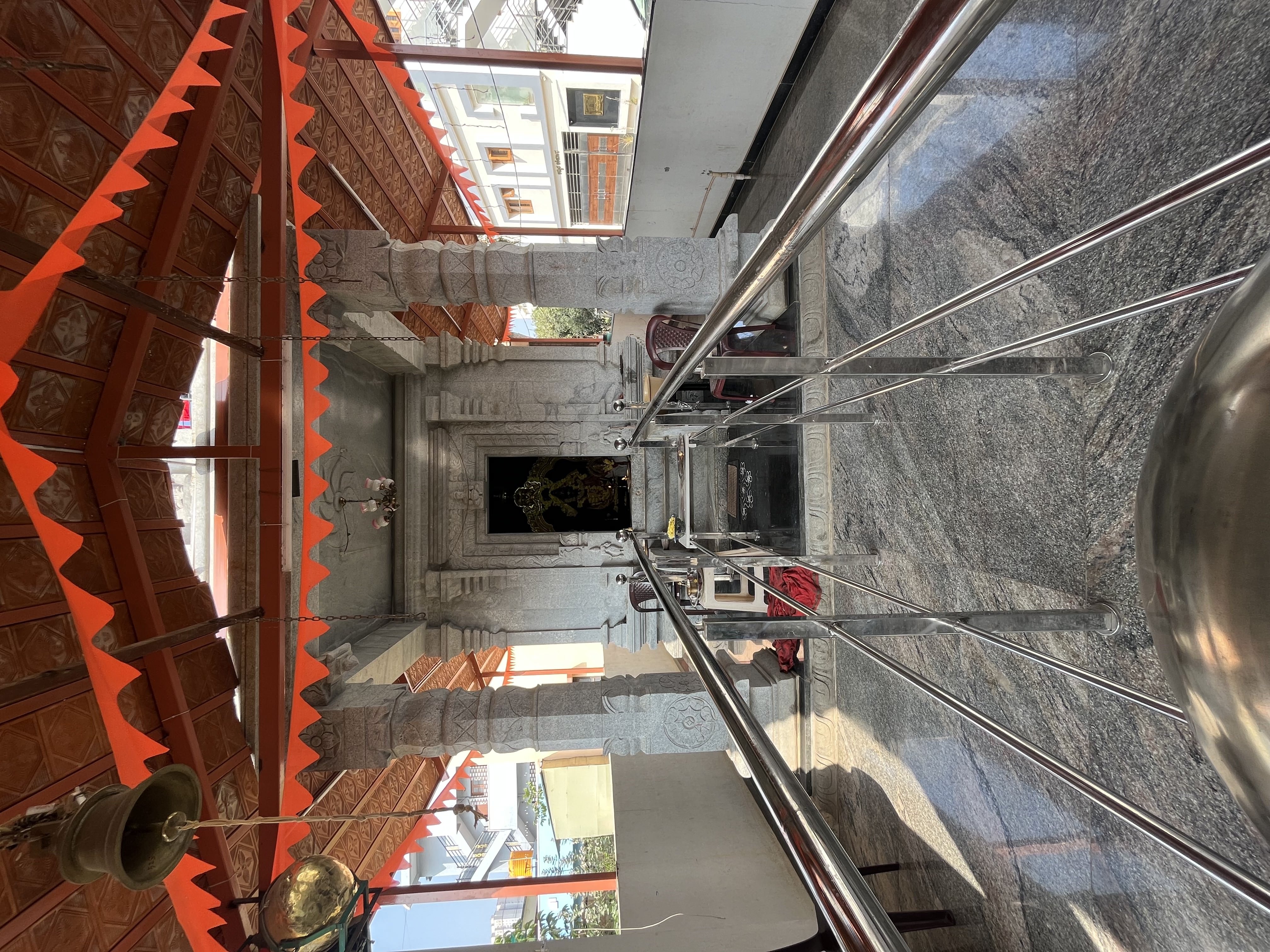 Shri Sankashtahara Maha Ganapathi Temple interior showing beautiful Ganesha idol with traditional decorations and divine presence